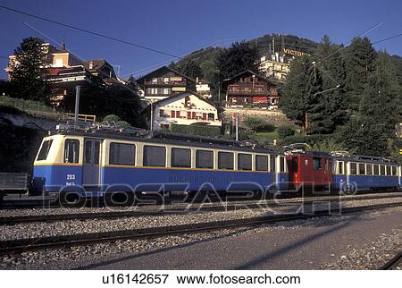 train, Switzerland, Vaud, Caux, Rochers de Naye, mountain train, in the village of Caux in the Canton of Vaud. View Large Photo Image Stock Photo - train, Switzerland, Vaud, Caux, Rochers de Naye, mountain train, in the village of Caux in the Canton of Vaud. . Fotosearch