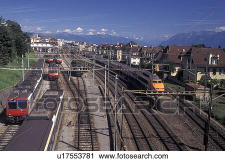 train, TGV, Lausanne, Switzerland, Vaud, Trains and TGV parked along train tracks at train station in Lausanne. View Large Photo Image Stock Image - train, TGV, Lausanne, Switzerland, Vaud, Trains and TGV parked along train tracks at train station in Lausanne.. Fotosearch