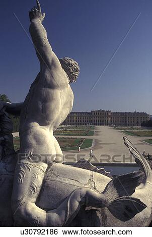 Vienna, Schonbrunn Palace, Austria, Wien, View of Schloss Schonbrunn from the Neptune's Fountain statue. View Large Photo Image Stock Photograph - Vienna, Schonbrunn Palace, Austria, Wien, View of Schloss Schonbrunn from the Neptune's Fountain statue.. Fotosearch