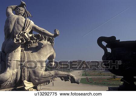 Stock Photography -  Vienna, Schonbrunn Palace, Austria, Wien, View of Schloss Schonbrunn from the Neptune's Fountain statue.. Fotosearch