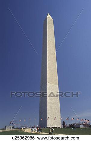 Washington Monument, Washington, DC, District of Columbia, Washington Monument surrounded by American Flags in the spring at National Mall in Washington, D. C. View Large Photo Image Stock Photograph - Washington Monument, Washington, DC, District of Columbia, Washington Monument surrounded by American Flags in the spring at National Mall in Washington, D. C.. Fotosearch