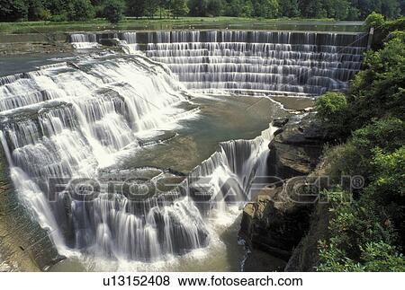 waterfall, Ithaca, NY, New York, Finger Lakes, Triphammer Falls at Beebe Lake on the campus of Cornell University. View Large Photo Image Stock Photo - waterfall, Ithaca, NY, New York, Finger Lakes, Triphammer Falls at Beebe Lake on the campus of Cornell University.. Fotosearch