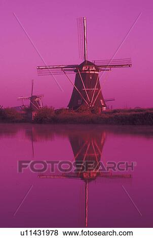 windmill, canal, Kinderdijk, Holland, Netherlands, Zuid-Holland, Europe, Mills of Kinderdijk, Working windmills along a canal in the early morning in Kinderdijk. View Large Photo Image Stock Photo - windmill, canal, Kinderdijk, Holland, Netherlands, Zuid-Holland, Europe, Mills of Kinderdijk, Working windmills along a canal in the early morning in Kinderdijk. . Fotosearch