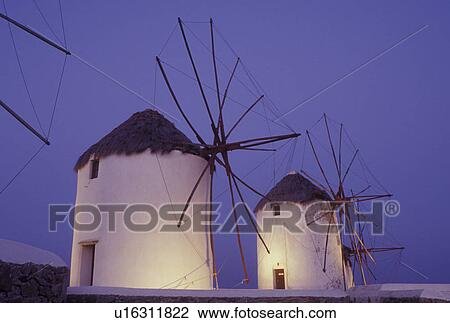 Stock Image -  windmill, Greece, Mykonos, Greek Islands, Cyclades, Europe, Windmills on Mykonos in the evening.. Fotosearch