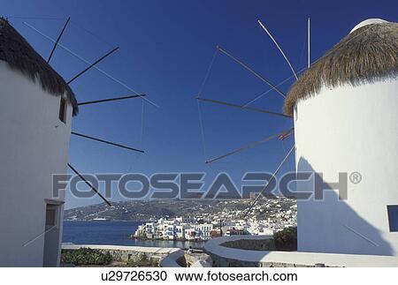 windmill, Greece, Mykonos, Greek Islands, Cyclades, Europe, Windmills on Mykonos and view of harbor on the Aegean Sea. View Large Photo Image Stock Image - windmill, Greece, Mykonos, Greek Islands, Cyclades, Europe, Windmills on Mykonos and view of harbor on the Aegean Sea.. Fotosearch