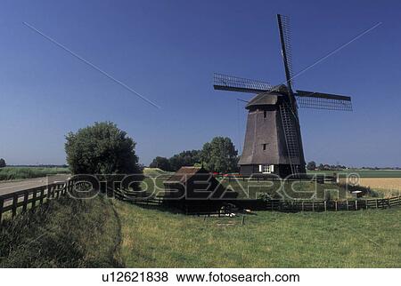 windmill, Netherlands, Schermerhorn, Holland, Noord-Holland, Europe, Windmill in the scenic countryside in Schermerhorn. View Large Photo Image Stock Photo - windmill, Netherlands, Schermerhorn, Holland, Noord-Holland, Europe, Windmill in the scenic countryside in Schermerhorn.. Fotosearch