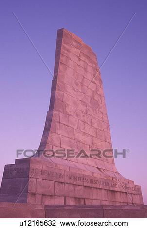 Wright Brothers National Memorial, NC, North Carolina, Outer Banks, The Wright Memorial Shaft on Kills Devil Hill in the Outer Banks of North Carolina at sunset. View Large Photo Image Stock Image - Wright Brothers National Memorial, NC, North Carolina, Outer Banks, The Wright Memorial Shaft on Kills Devil Hill in the Outer Banks of North Carolina at sunset.. Fotosearch