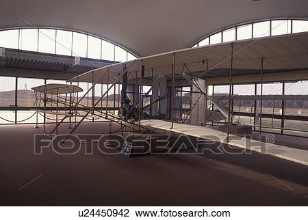 Wright Brothers National Memorial, NC, North Carolina, Outer Banks, Wright Brothers plane inside the Wright Brothers National Memorial Visitor Center in the Outer Banks of North Carolina. The 1902 glider and 1903 flyer. View Large Photo Image Stock Image - Wright Brothers National Memorial, NC, North Carolina, Outer Banks, Wright Brothers plane inside the Wright Brothers National Memorial Visitor Center in the Outer Banks of North Carolina. The 1902 glider and 1903 flyer.. Fotosearch