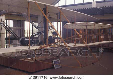 Wright Brothers National Memorial, NC, North Carolina, Outer Banks, Wright Brothers plane inside the Wright Brothers National Memorial Visitor Center in the Outer Banks of North Carolina. The 1902 glider and 1903 flyer. View Large Photo Image Stock Photograph - Wright Brothers National Memorial, NC, North Carolina, Outer Banks, Wright Brothers plane inside the Wright Brothers National Memorial Visitor Center in the Outer Banks of North Carolina. The 1902 glider and 1903 flyer.. Fotosearch