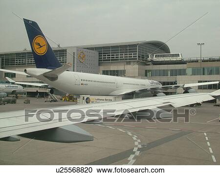 airport, Frankfurt, Germany, Europe, Lufthansa Airline planes parked at the gates of the Frankfurt Terminal. View Large Photo Image Stock Image - airport, Frankfurt, Germany, Europe, Lufthansa Airline planes parked at the gates of the Frankfurt Terminal.. Fotosearch