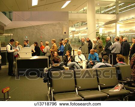 airport, Philadelphia, PA, Pennsylvania, Passengers waiting to board the plane inside the Philadelphia International Airport in Philadelphia. View Large Photo Image Stock Photograph - airport, Philadelphia, PA, Pennsylvania, Passengers waiting to board the plane inside the Philadelphia International Airport in Philadelphia.. Fotosearch