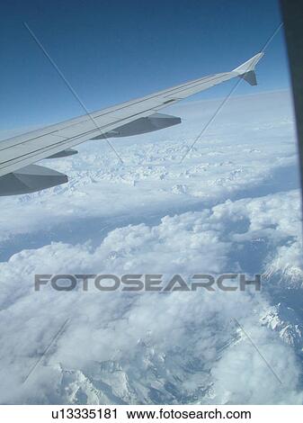 Alps, Europe, Aerial view of the Alps from an airplane View Large Photo Image Stock Image - Alps, Europe, Aerial view of the Alps from an airplane . Fotosearch