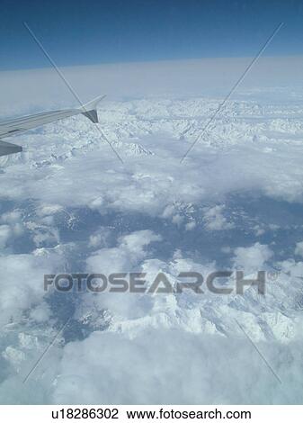 Alps, Europe, Aerial view of the Alps from an airplane View Large Photo Image Stock Image - Alps, Europe, Aerial view of the Alps from an airplane . Fotosearch