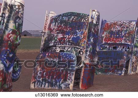 Stock Photo -  Amarillo, TX, Texas, Cadillac Ranch along Route 66, 10 tail fins from 1949-1963, Hood Ornament of Route 66. Fotosearch