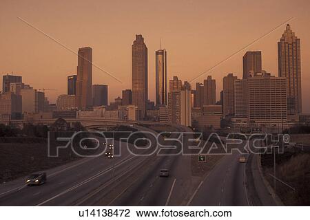 Stock Image -  Atlanta, GA, Georgia, Downtown skyline, Presidential Parkway, early morning, expressway. Fotosearch