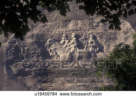 Picture -  Atlanta, GA, Georgia, Georgia Stone Mountain Park, Confederate Memorial Carving on Stone Mountain, President Jefferson Davis, General Thomas Stonewall Jackson and General Robert E. Lee, granite rock. Fotosearch