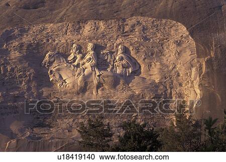 Stock Image -  Atlanta, GA, Georgia, Georgia Stone Mountain Park, Confederate Memorial Carving on Stone Mountain, President Jefferson Davis, General Thomas Stonewall Jackson and General Robert E. Lee, granite rock. Fotosearch