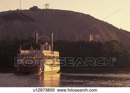 Stock Photo -  Atlanta, GA, Georgia, Georgia Stone Mountain Park, Paddle Wheel Riverboat on Stone Mountain Lake. Fotosearch