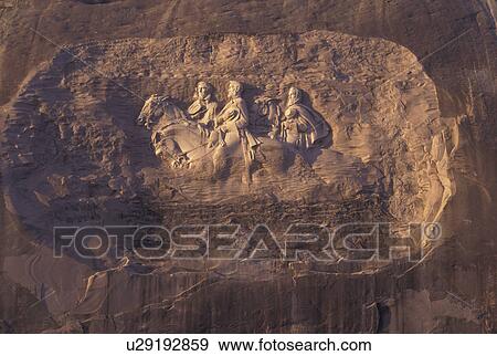 Stock Photo -  Atlanta, GA, Georgia, Georgia Stone Mountain Park, Confederate Memorial Carving on Stone Mountain, President Jefferson Davis, General Thomas Stonewall Jackson and General Robert E. Lee, granite rock. Fotosearch