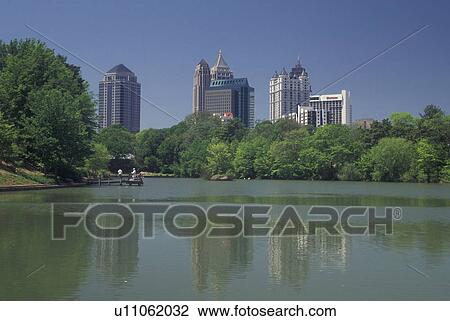 Stock Image -  Atlanta, GA, Georgia, Piedmont Park, Midtown skyline. Fotosearch