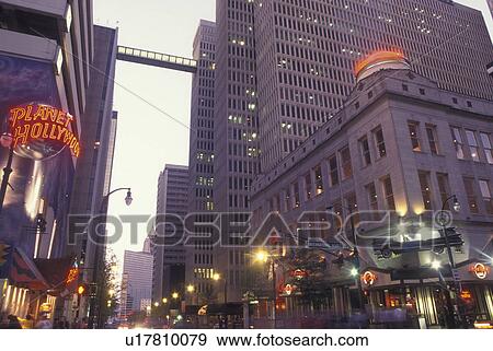 Stock Photo -  Atlanta, GA, Georgia, Planet Hollywood, Hard Rock CafT, Peachtree Street, downtown, evening. Fotosearch