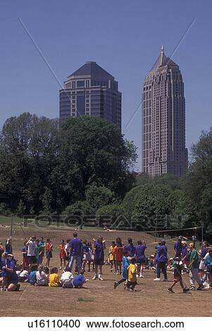 Atlanta, GA, Georgia, School volleyball game at Piedmont Park, downtown skyline View Large Photo Image Stock Image - Atlanta, GA, Georgia, School volleyball game at Piedmont Park, downtown skyline. Fotosearch