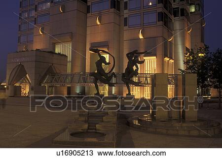 Stock Image -  Atlanta, GA, Georgia, SunTrust Plaza, Olympic Ballet Statue, downtown, evening. Fotosearch