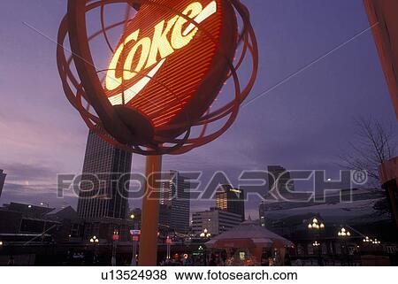 Stock Photo -  Atlanta, GA, Georgia, World of Coca-Cola, Underground Atlanta, evening, downtown skyline. Fotosearch