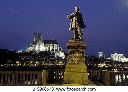 Auxerre, Burgundy, France, Yonne, Bourgogne, Europe, wine region, Statue of Paul Bert along the Yonne River in the city of Auxerre. Cathedral St. Etienne in the background. View Large Photo Image Stock Image - Auxerre, Burgundy, France, Yonne, Bourgogne, Europe, wine region, Statue of Paul Bert along the Yonne River in the city of Auxerre. Cathedral St. Etienne in the background.. Fotosearch