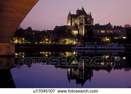 Stock Photo -  Auxerre, France, Burgundy, Yonne, Bourgogne, Europe, wine region, Reflection of the Cathedral St. Etienne in the Yonne River in the evening in the city of Auxerre.. Fotosearch