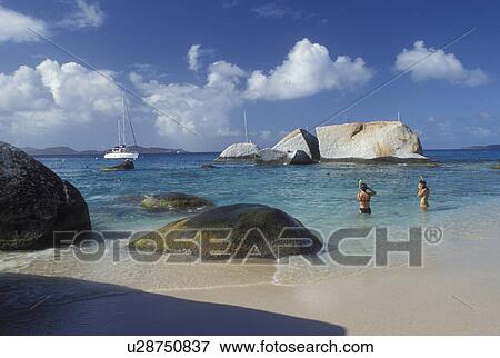 Stock Photo -  beach, Virgin Gorda, The Baths, BVI, British Virgin Islands, Caribbean, Snorkeling along the rocky coastline of Devils Bay Nat'l Park at The Baths on Virgin Gorda on the Caribbean Sea.. Fotosearch