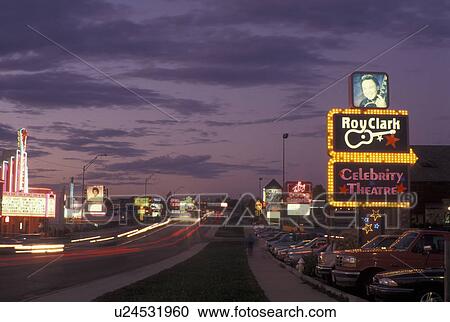 Stock Image -  Branson, MO, Missouri, Dinner Theatres on The Strip along 76 Country Boulevard, evening. Fotosearch