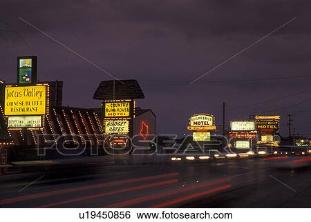 Stock Photograph -  Branson, MO, Missouri, The Strip along 76 Country Boulevard in the evening. Fotosearch
