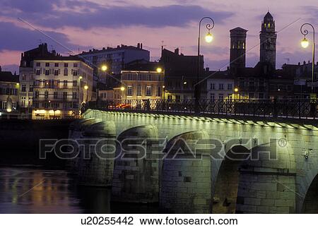 bridge, Burgundy, Macon, France, Bourgogne, Saone-et-Loire, Europe, wine region, The 11th century Pont de St-Laurent spans the Saone River in the city of Macon in the evening. View Large Photo Image Stock Image - bridge, Burgundy, Macon, France, Bourgogne, Saone-et-Loire, Europe, wine region, The 11th century Pont de St-Laurent spans the Saone River in the city of Macon in the evening.. Fotosearch