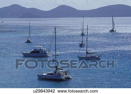 British Virgin Islands, Jost Van Dyke, Caribbean, BVI, Scenic view of Great Harbor on Jost Van Dyke Island on the Caribbean Sea. View Large Photo Image Stock Image - British Virgin Islands, Jost Van Dyke, Caribbean, BVI, Scenic view of Great Harbor on Jost Van Dyke Island on the Caribbean Sea.. Fotosearch