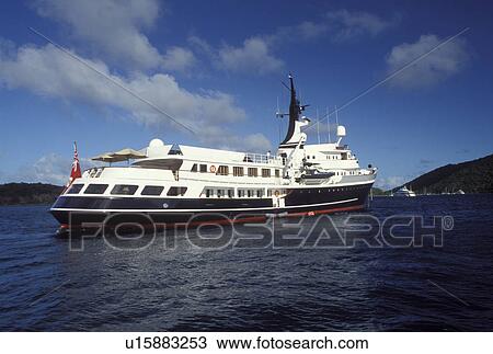 Stock Image -  British Virgin Islands, Peter Island, Caribbean, BVI, Private yacht off Peter Island on the Caribbean Sea.. Fotosearch