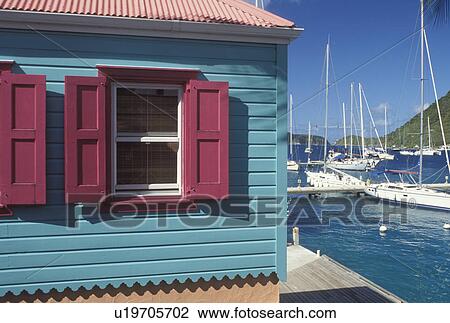Stock Image -  British Virgin Islands, Tortola, West End, Caribbean, BVI, Sopers Hole Marina and shopping wharf at Frenchman's Cay on the island of Tortola.. Fotosearch