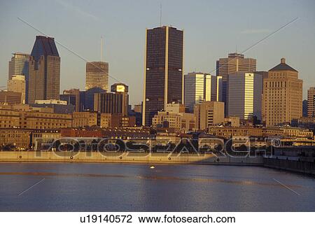Canada, Montreal, Quebec, Skyline of downtown Montreal along the St. Lawrence River (Fleuve Saint-Laurent). View Large Photo Image Stock Image - Canada, Montreal, Quebec, Skyline of downtown Montreal along the St. Lawrence River (Fleuve Saint-Laurent).. Fotosearch