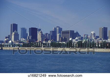 Canada, Montreal, Quebec, Skyline of downtown Montreal along the St. Lawrence River (Fleuve Saint-Laurent). View Large Photo Image Stock Photo - Canada, Montreal, Quebec, Skyline of downtown Montreal along the St. Lawrence River (Fleuve Saint-Laurent).. Fotosearch