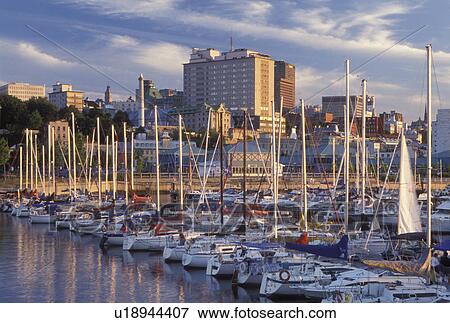 Stock Photo -  Canada, Quebec City, Quebec, Downtown skyline of Quebec City from the marina in the harbor.. Fotosearch