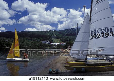 Canada, Quebec, Laurentians, Mount Tremblant, Hobie Cat, Sailboats on the beach along Lac Tremblant in the Laurentian Mountains. View Large Photo Image Stock Image - Canada, Quebec, Laurentians, Mount Tremblant, Hobie Cat, Sailboats on the beach along Lac Tremblant in the Laurentian Mountains.. Fotosearch