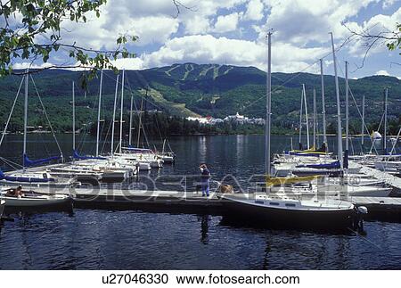 Stock Image -  Canada, Quebec, Laurentians, Mount Tremblant, Marina on Lac Tremblant in the Laurentian Mountains.. Fotosearch