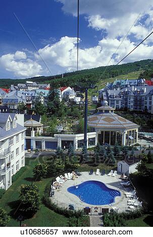 Canada, Quebec, Laurentians, Mount Tremblant, Tremblant Resort Village from the aerial tramway in the Laurentian Mountains. View Large Photo Image Stock Photo - Canada, Quebec, Laurentians, Mount Tremblant, Tremblant Resort Village from the aerial tramway in the Laurentian Mountains.. Fotosearch