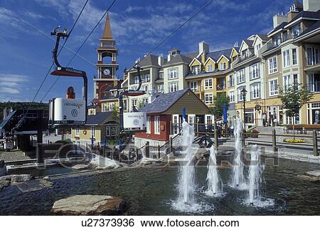Canada, Quebec, Laurentians, Mount Tremblant, Aerial tram ride through Tremblant Resort Village in the Laurentian Mountains. View Large Photo Image Stock Photograph - Canada, Quebec, Laurentians, Mount Tremblant, Aerial tram ride through Tremblant Resort Village in the Laurentian Mountains.. Fotosearch