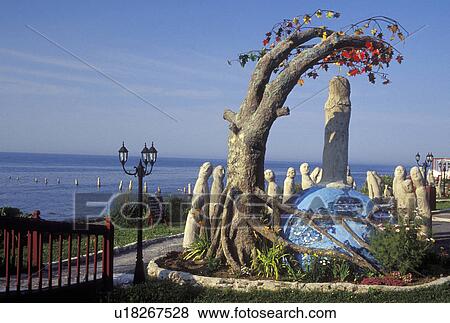 Canada, Ste-Flavie, Quebec, Gulf of St. Lawrence, Stonework statue The Great Gathering along the St. Lawrence River (Fleuve Saint-Laurent) View Large Photo Image Stock Photo - Canada, Ste-Flavie, Quebec, Gulf of St. Lawrence, Stonework statue The Great Gathering along the St. Lawrence River (Fleuve Saint-Laurent). Fotosearch