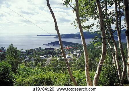Canada, Tadoussac, Quebec, Overlooking the summer resort town of Tadoussac along the St. Lawrence (Fleuve Saint-Laurent) and Saguenay Rivers. View Large Photo Image Stock Image - Canada, Tadoussac, Quebec, Overlooking the summer resort town of Tadoussac along the St. Lawrence (Fleuve Saint-Laurent) and Saguenay Rivers.. Fotosearch