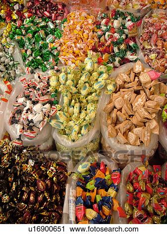 Stock Image -  candy, Tuscany, Italy, Montalcino, Toscana, Europe, Assorted candy for sale at the outdoor market in the town of Montalcino.. Fotosearch