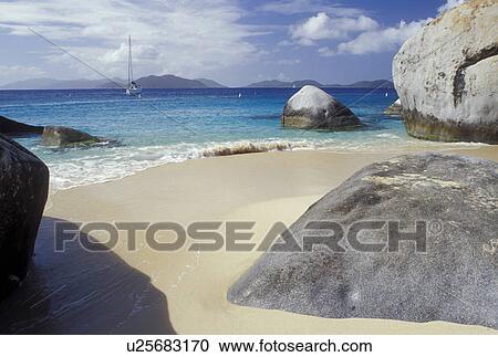 Stock Image -  Caribbean, BVI, Virgin Gorda, The Baths, British Virgin Islands, Scenic view of the rocky coastline of Devils Bay Nat'l Park at The Baths on Virgin Gorda on the Caribbean Sea.. Fotosearch