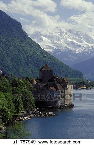 Chateau de Chillon, Switzerland, Montreux, Vaud, Alps, Lake Geneva, Europe, Picturesque view of the Chateau de Chillon a 13th century fortress and the Alps along the lakeshore of Lac Leman in the spring in the Canton of Vaud. View Large Photo Image Stock Photo - Chateau de Chillon, Switzerland, Montreux, Vaud, Alps, Lake Geneva, Europe, Picturesque view of the Chateau de Chillon a 13th century fortress and the Alps along the lakeshore of Lac Leman in the spring in the Canton of Vaud. . Fotosearch