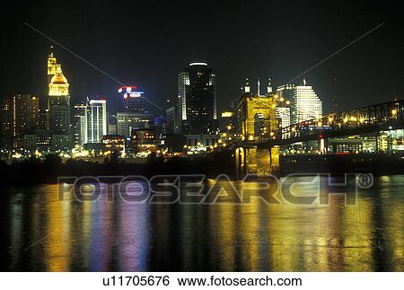Cincinnati, OH, Ohio, Downtown skyline along the Ohio River, evening View Large Photo Image Stock Photograph - Cincinnati, OH, Ohio, Downtown skyline along the Ohio River, evening. Fotosearch